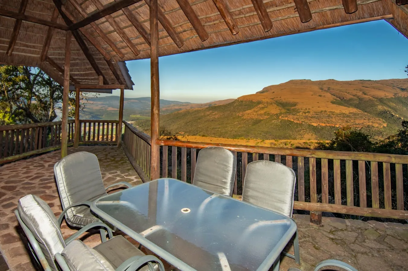 A chalet deck looking out over the valley
